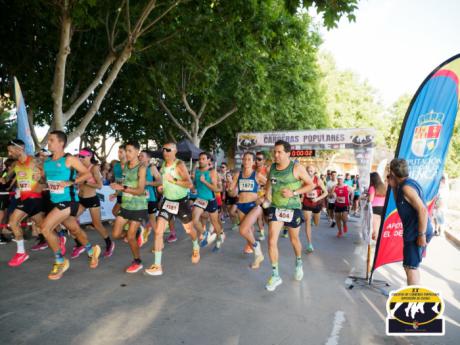 Andrés Felipe Sarta y Mª Ángeles Magán se coronan en la calurosa XL Carrera Popular Villa de Iniesta